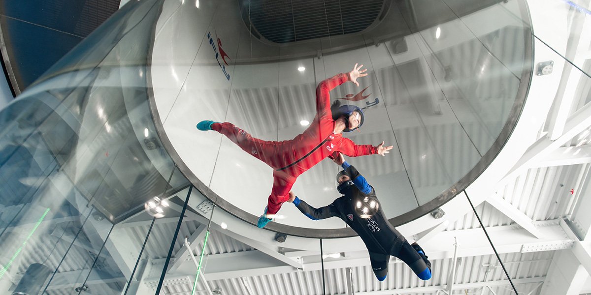 two people floating in air chamber