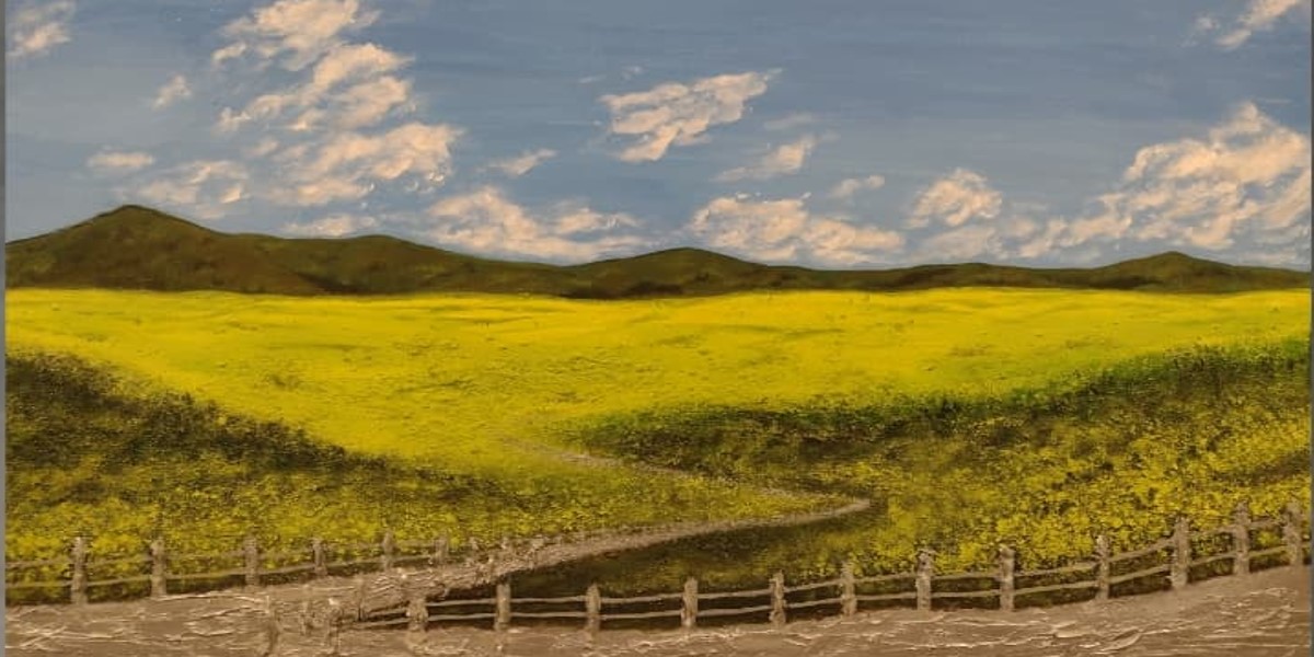 Landscape of hillside with green grass