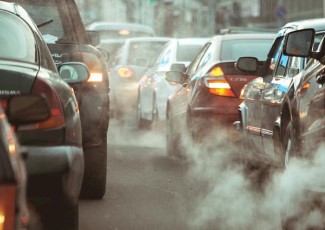Cars in traffic idling. 