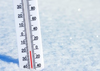 A thermometer in snow.