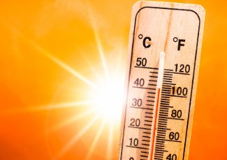 A thermometer with a sun. 