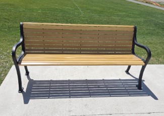 Close-up of a bench in a park