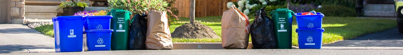 Garbage, recycling, and yard waste at the curb