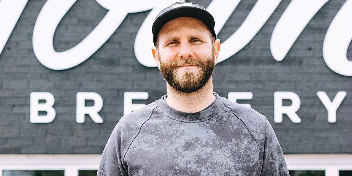 Town Brewery co-founder Jeff Talmey standing outside of the brewery