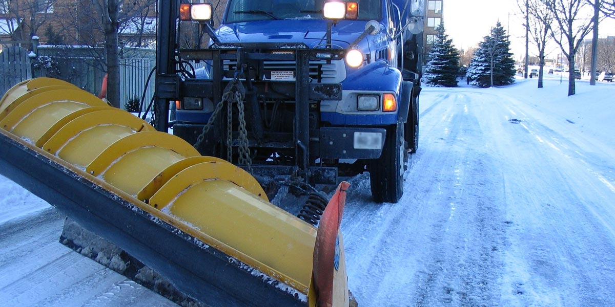 Whitby snow plow on road