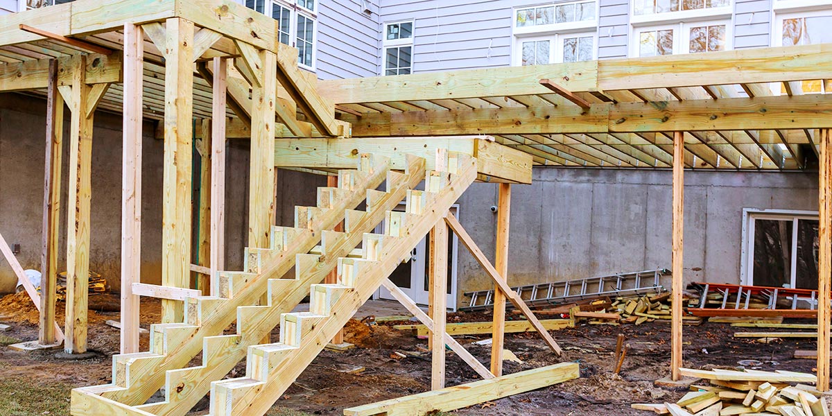 Large deck with stair being built