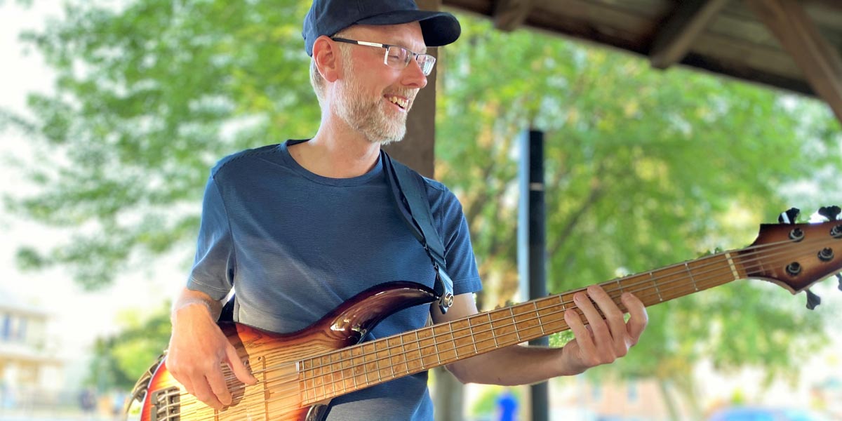 Person playing a guitar 