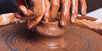 Artist Hands Making Pottery