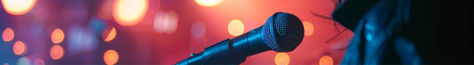 Musician and Microphone on Stage 