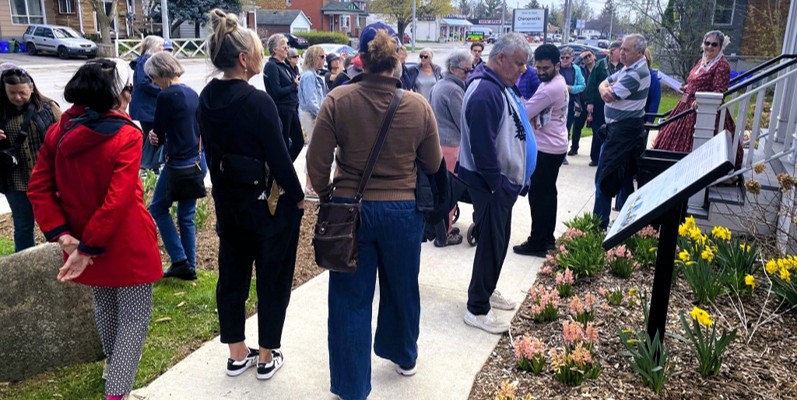 People gathered outside Lynde House for walking tour