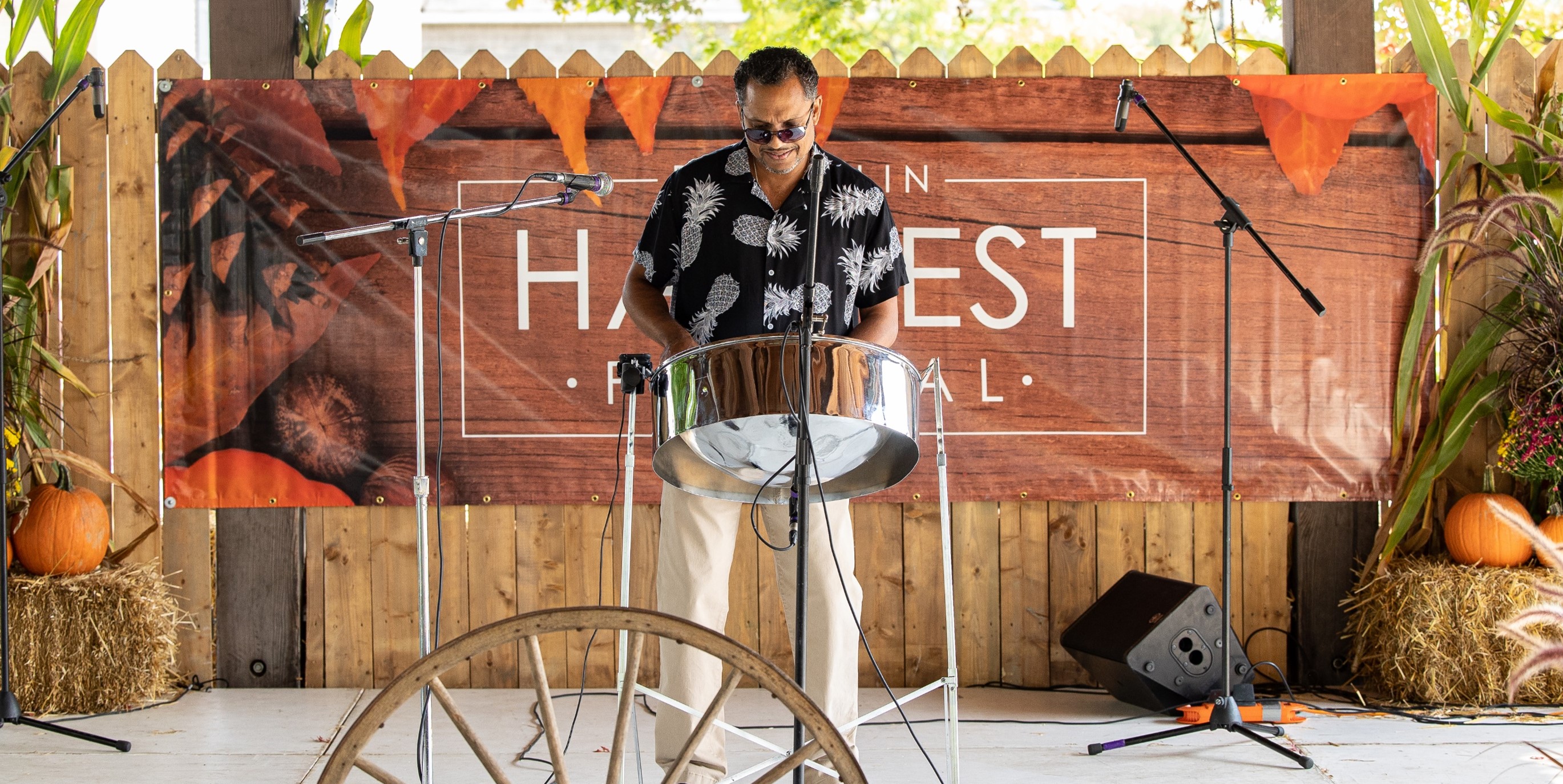 Steel Drum performer on harvest stage 
