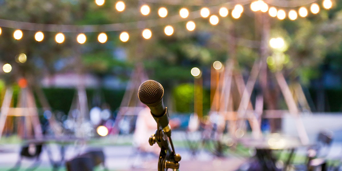 Microphone and stand in a park with lights