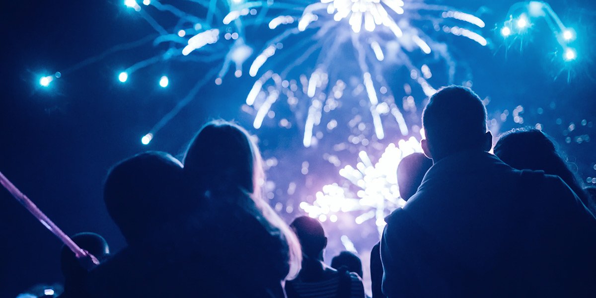 People watching fireworks in the sky