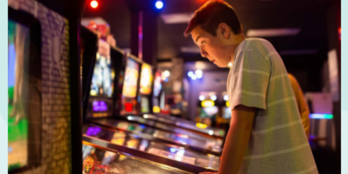 Person playing arcade game