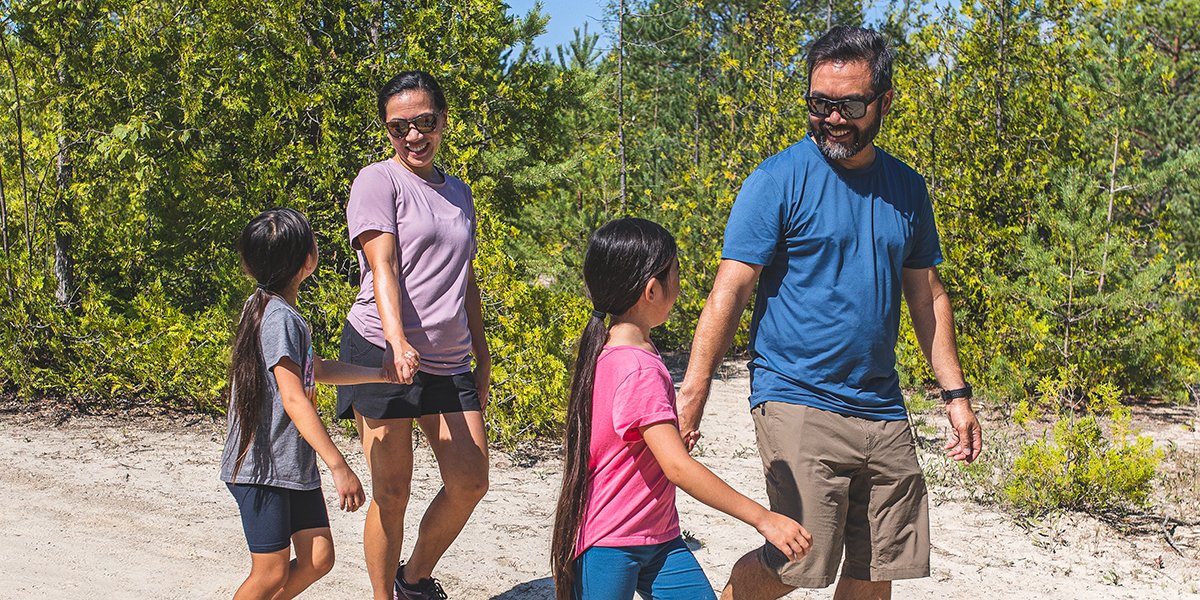 Family walking on a trail