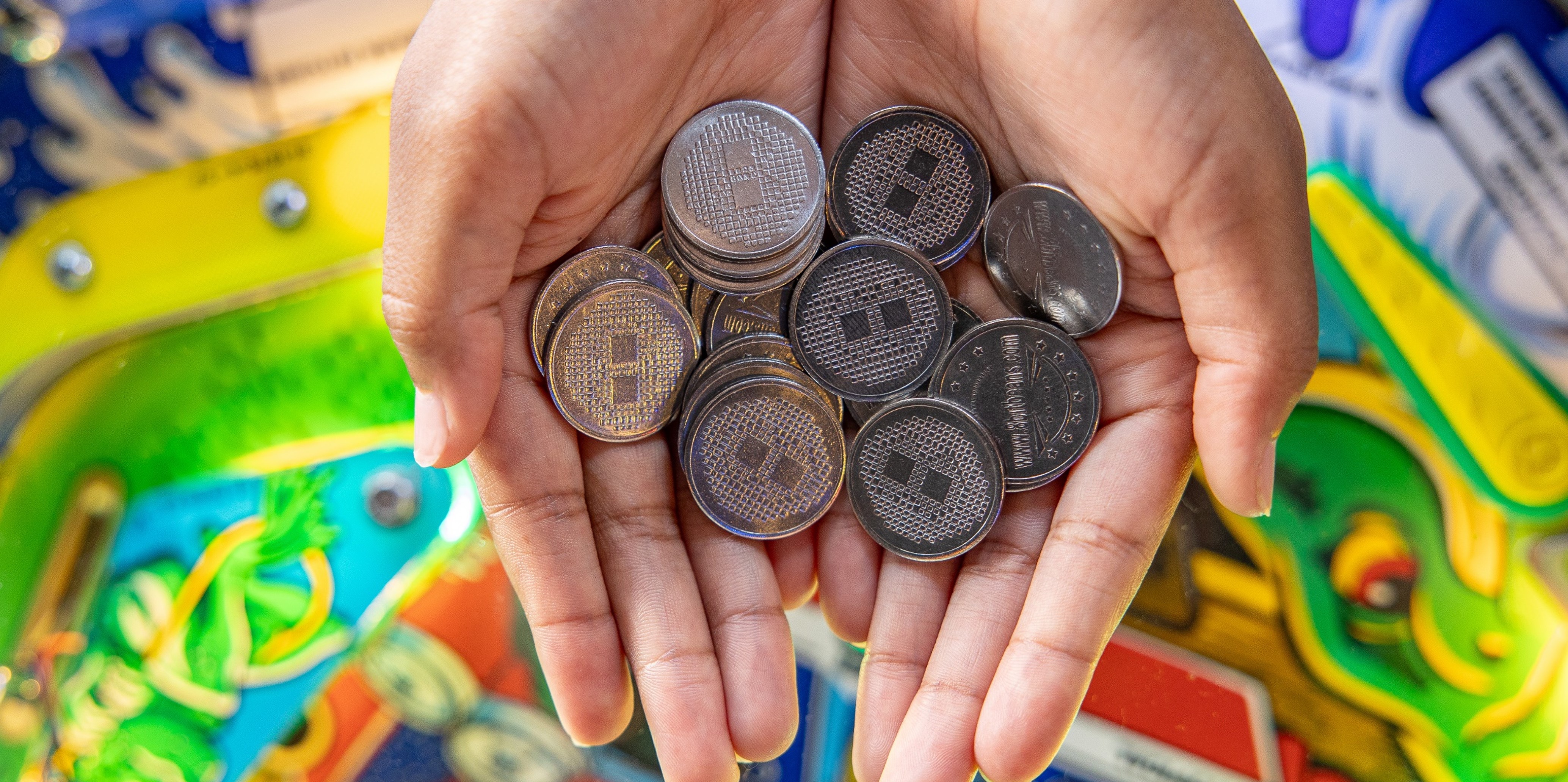 Pair of hands holding coins