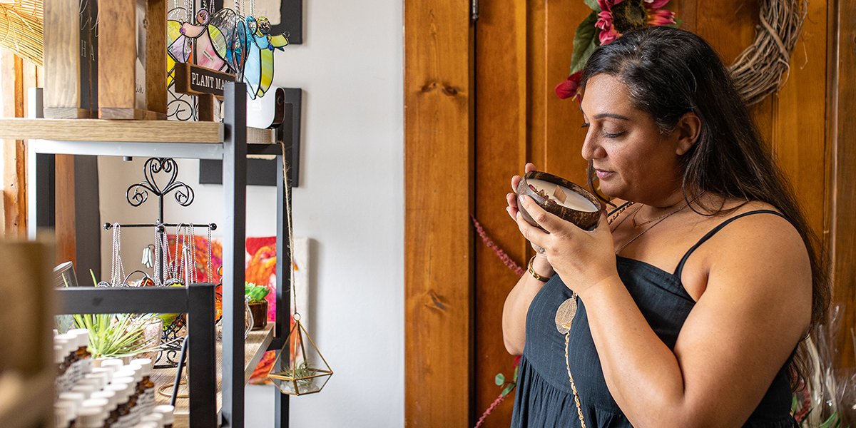 Person Shopping and smelling a candle