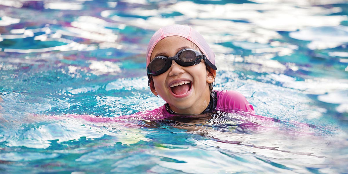 Young child swimming