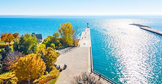 An aerial view of the Whitby pier and waterfront in fall