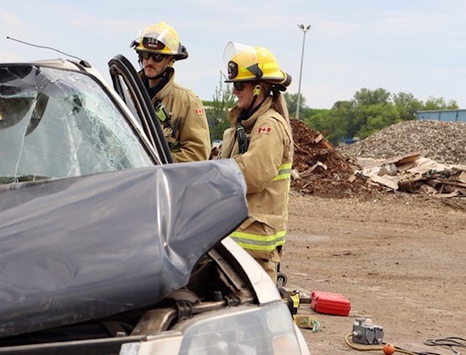 Whitby Firefighters and recruits gather for auto extrication training, designed to mimic real-life collisions. 