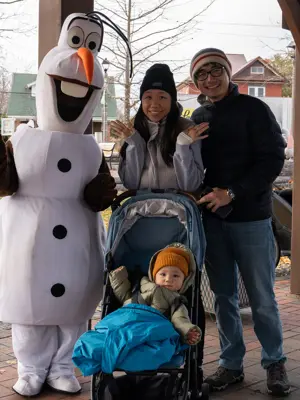 Olaf posing with family in Grass Park
