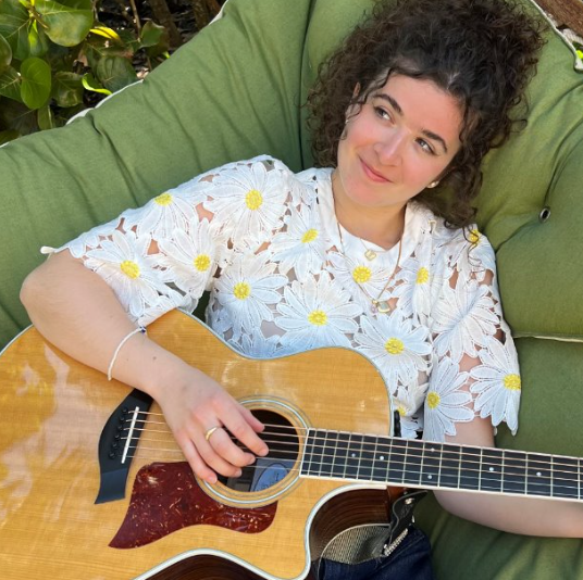 Mariah Dion Playing Guitar