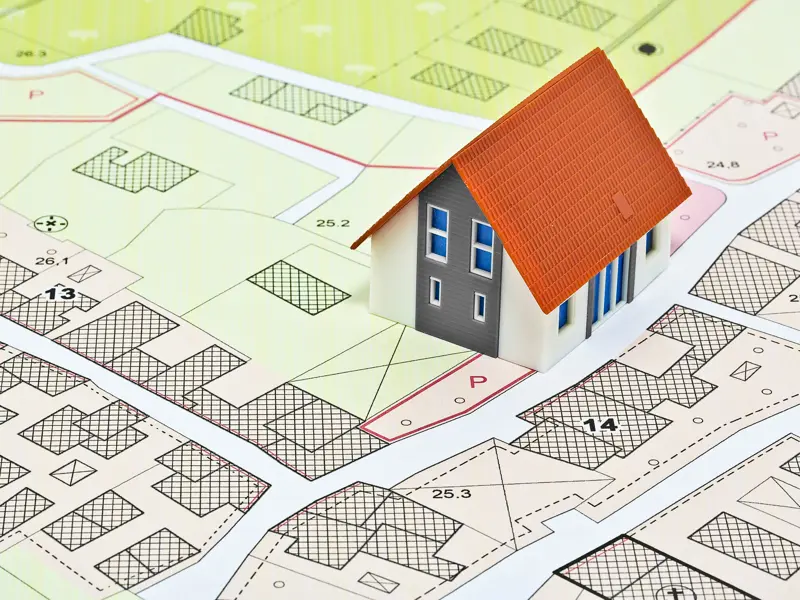 A tiny house laid out onto a planning map