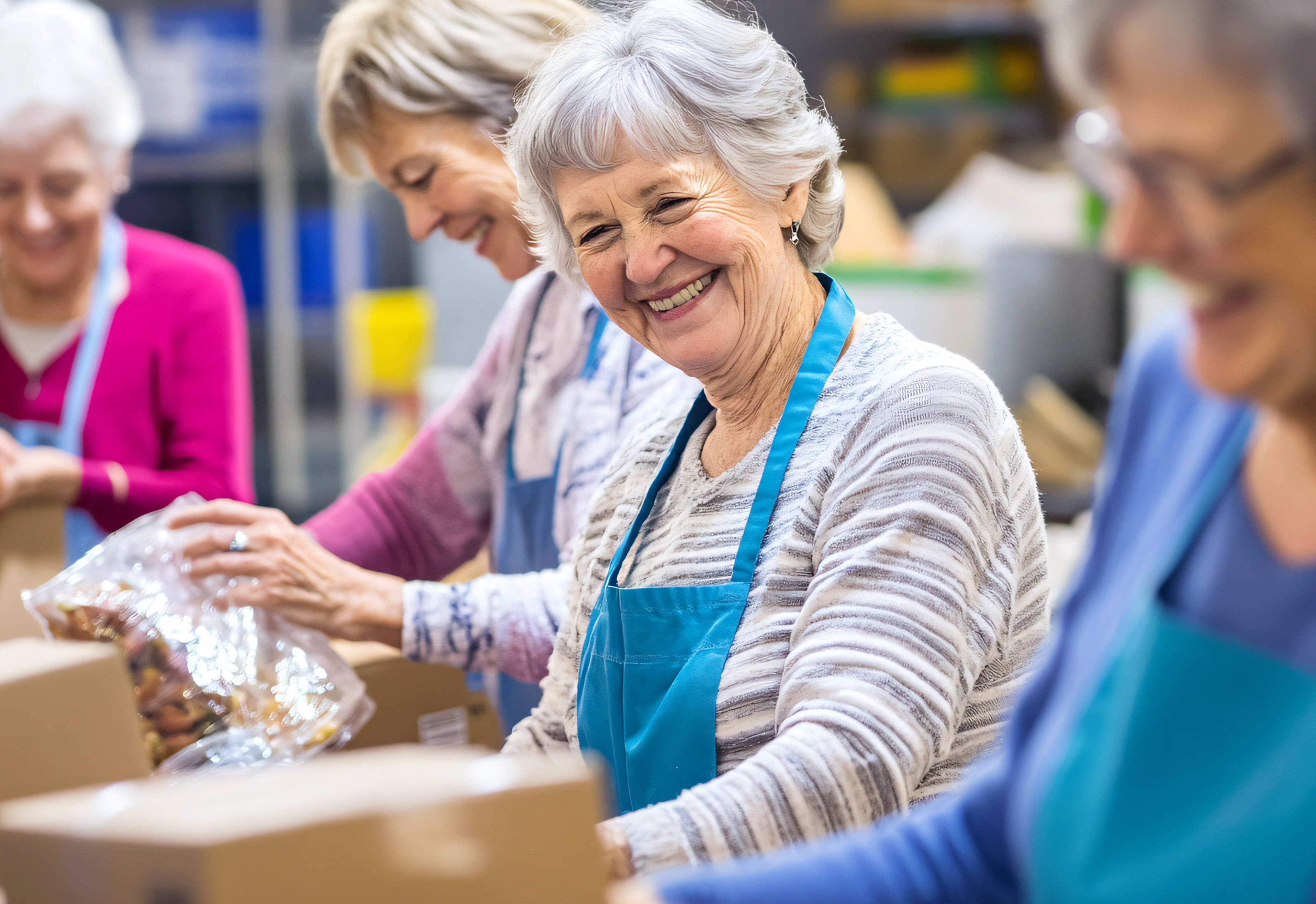 A group of senior volunteers sorting food