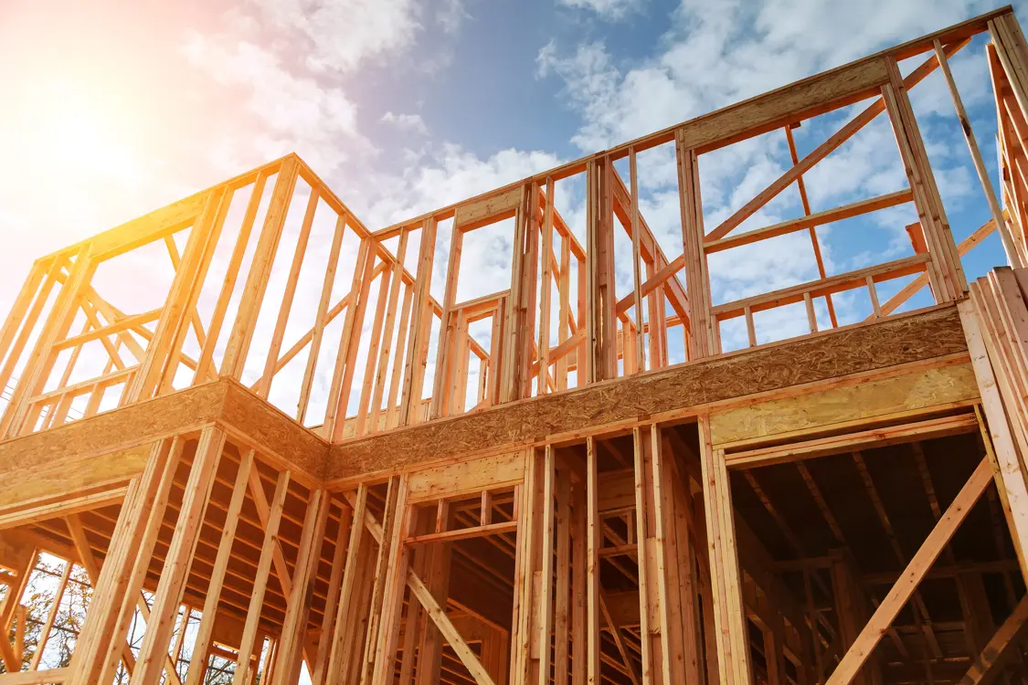 A close up of the wood framing on a new house being built