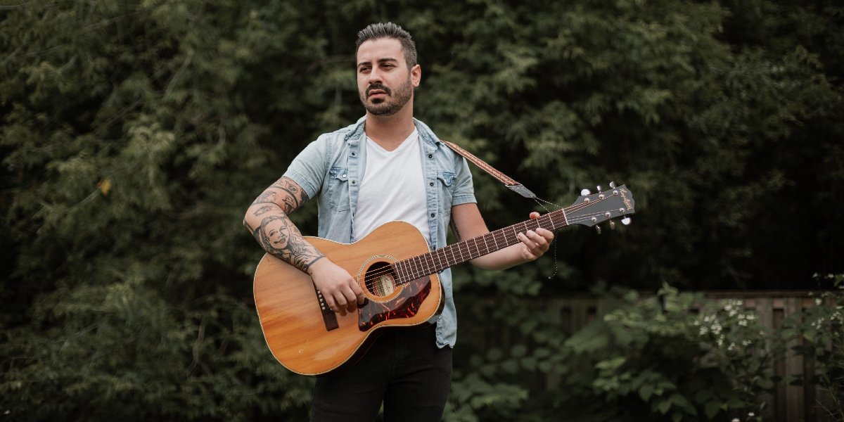 Images of Davey Boy playing guitar