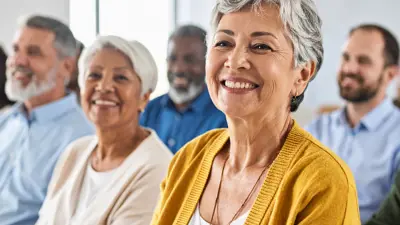 group of older adults listening to a seminar