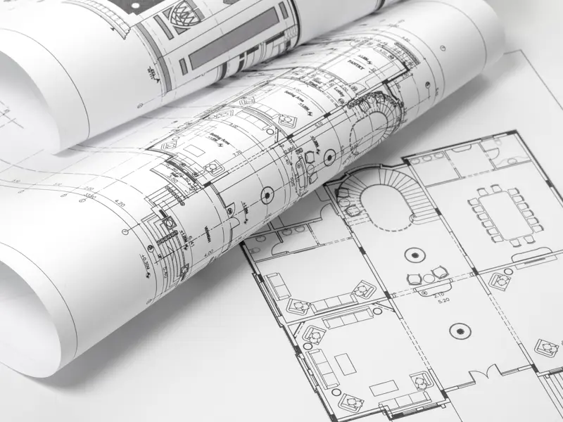 Blueprints laid out onto a table